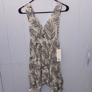 Rip Curl Asymmetrical Dress in Cream and Black